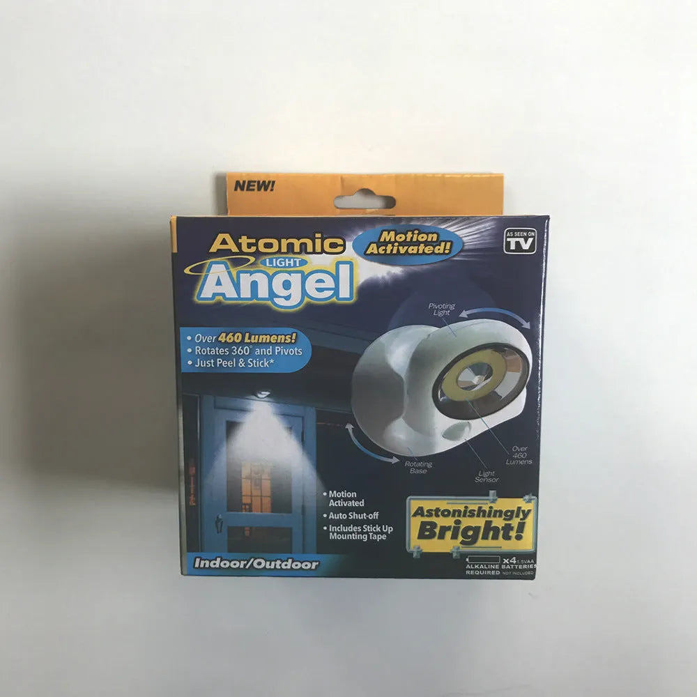 White Atomic Angel induction night light with compact rectangular design and touchless activation sensor