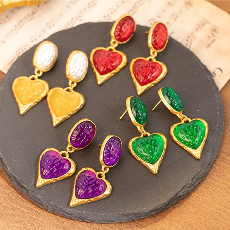 Silver needle pleated oval love heart stud earrings in green, purple, red, and yellow and white colours.