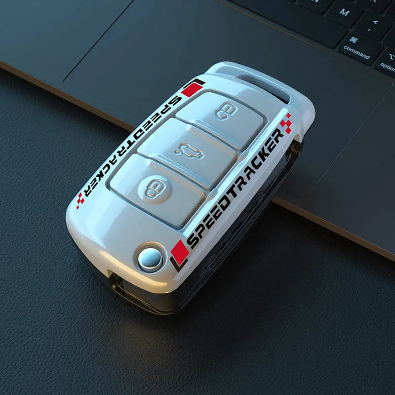 Carbon fibre style car key cover with mirror elements in carbon and white colour options