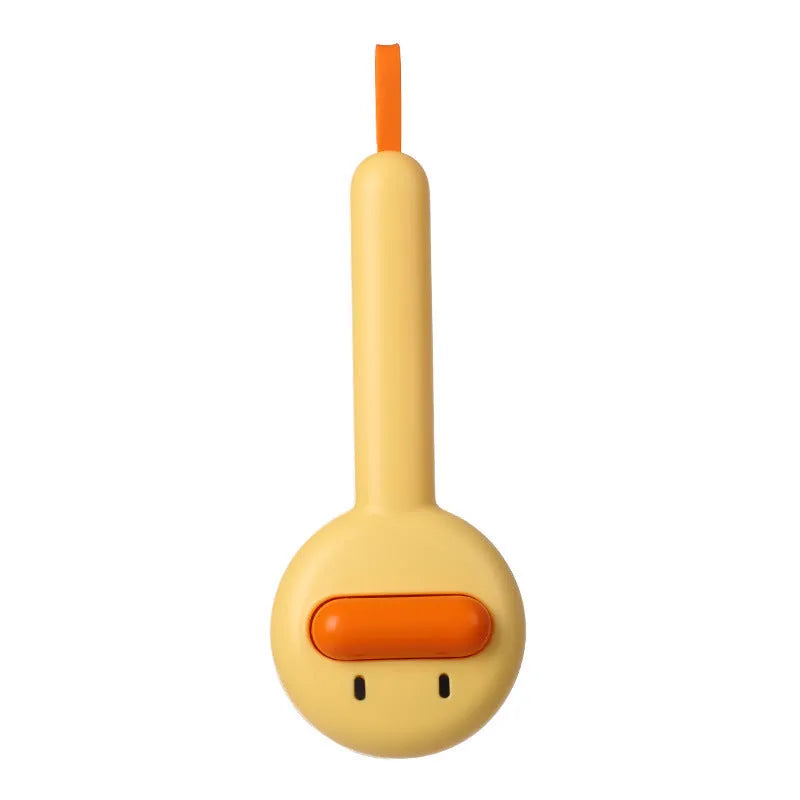 Small yellow duck-shaped pet comb with needle teeth for cat and dog grooming