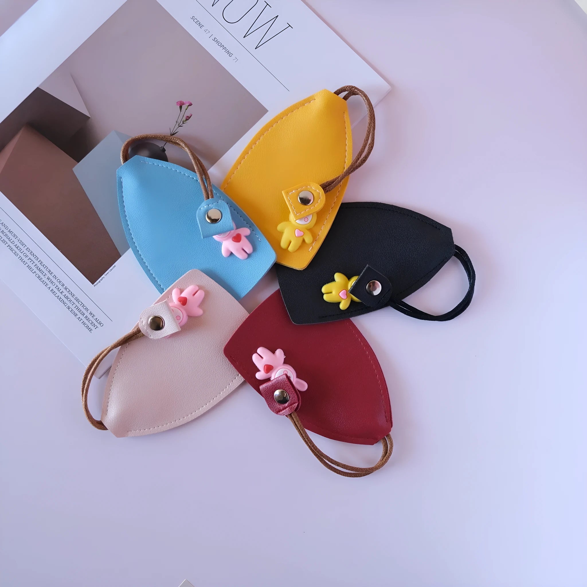 PU leather car key case in various colours showing key fob and credit card storage.