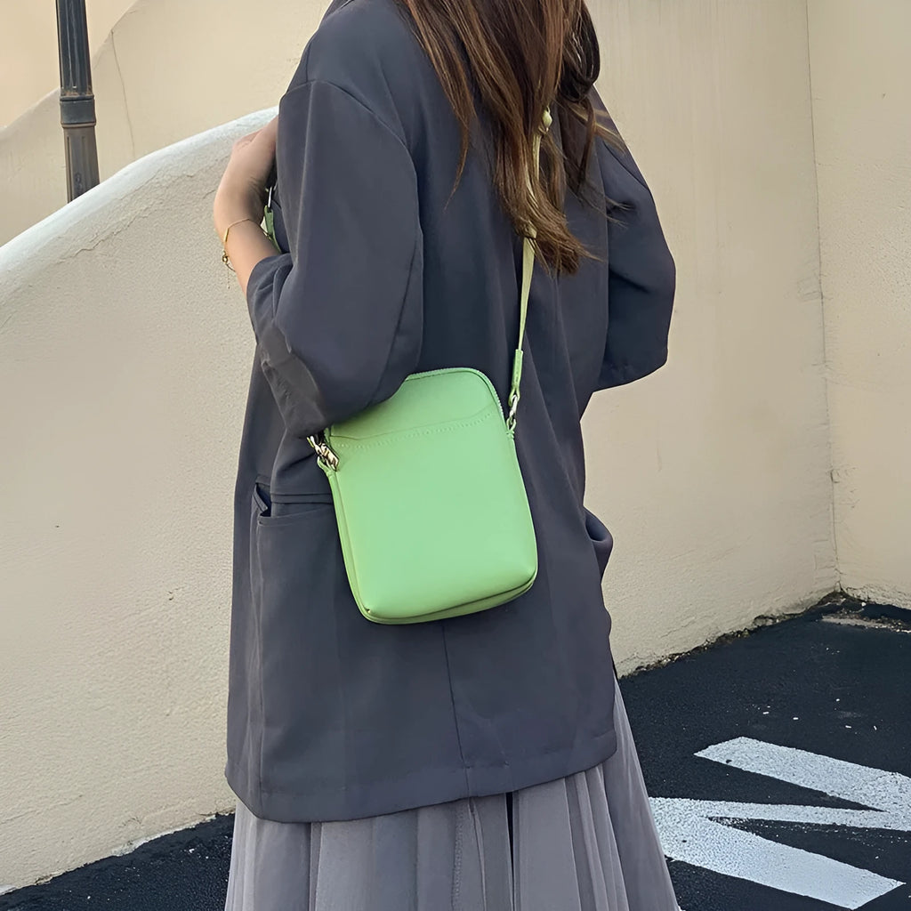 Solid colour PU mobile phone crossbody shoulder bag in black, beige, khaki, or green.