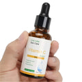 30ml bottle of Vitamin C essence serum for brightening uneven and dull skin
