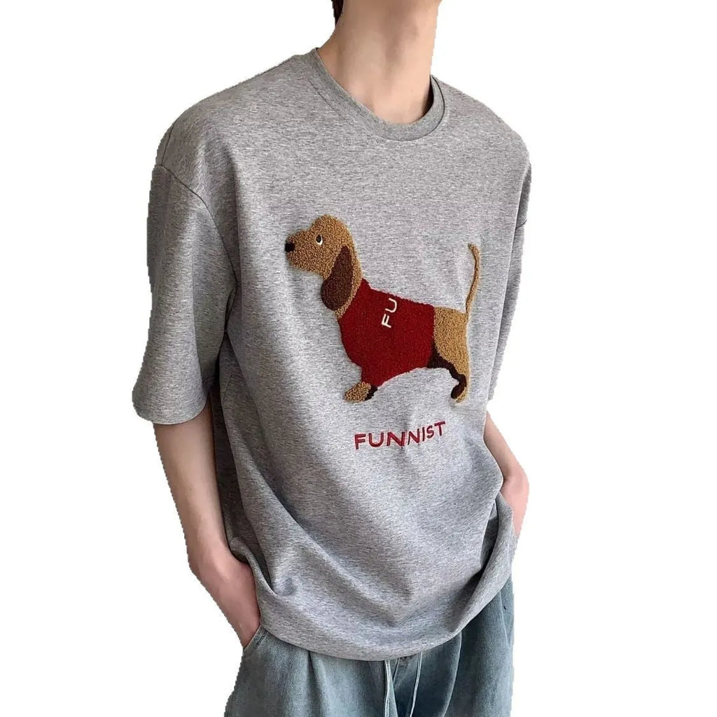 Grey men's cotton t-shirt with a detailed embroidered sausage dog design on the chest.