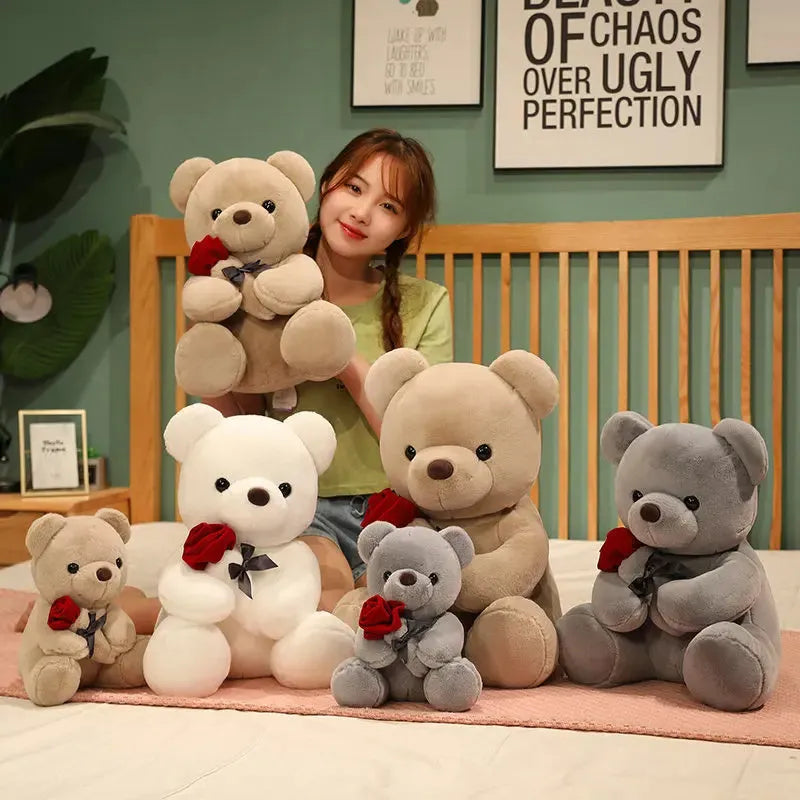 Rose bear plush teddy bear stuffed animal toy in beige, brown or grey colours showing cartoon design