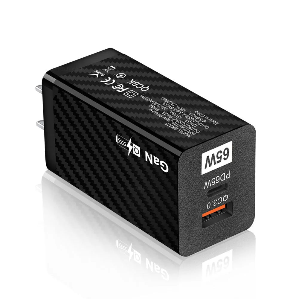 Gallium Nitride 65W laptop charger in black or white with compact dimensions and multiple electrical plug options