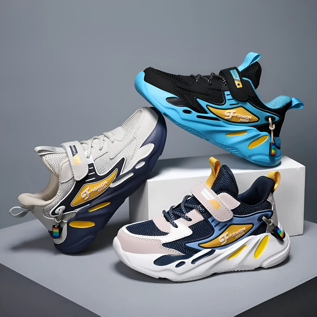 Boys' blue and black Velcro fastening sports shoes with a textured non-slip sole.
