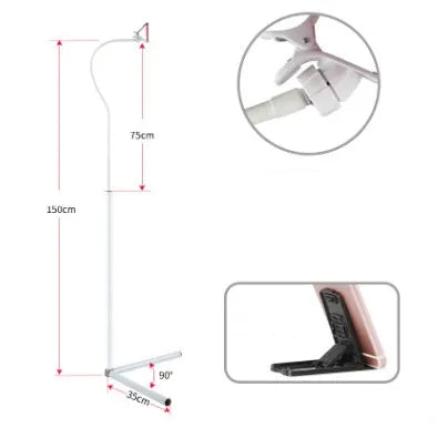 Black mobile phone bed bracket mounted bedside with phone in adjustable overhead viewing position