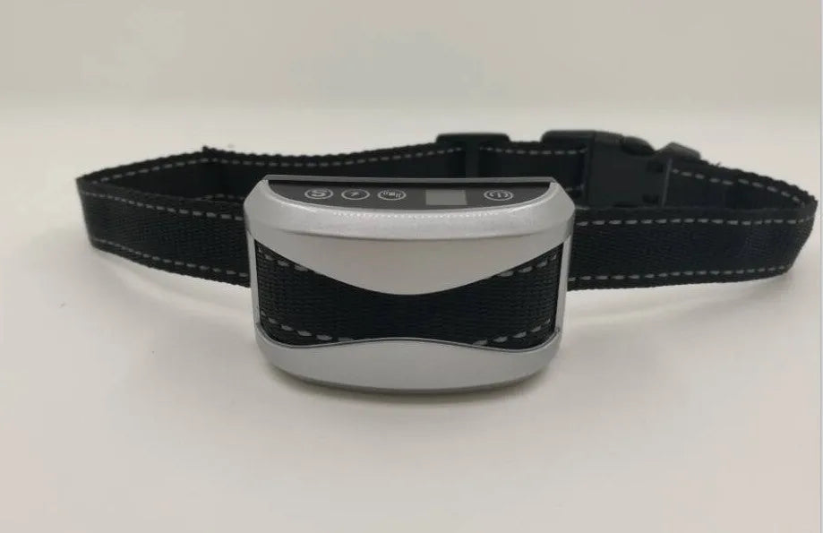 Electronic dog training bark collar with digital display and adjustable reflective nylon strap.