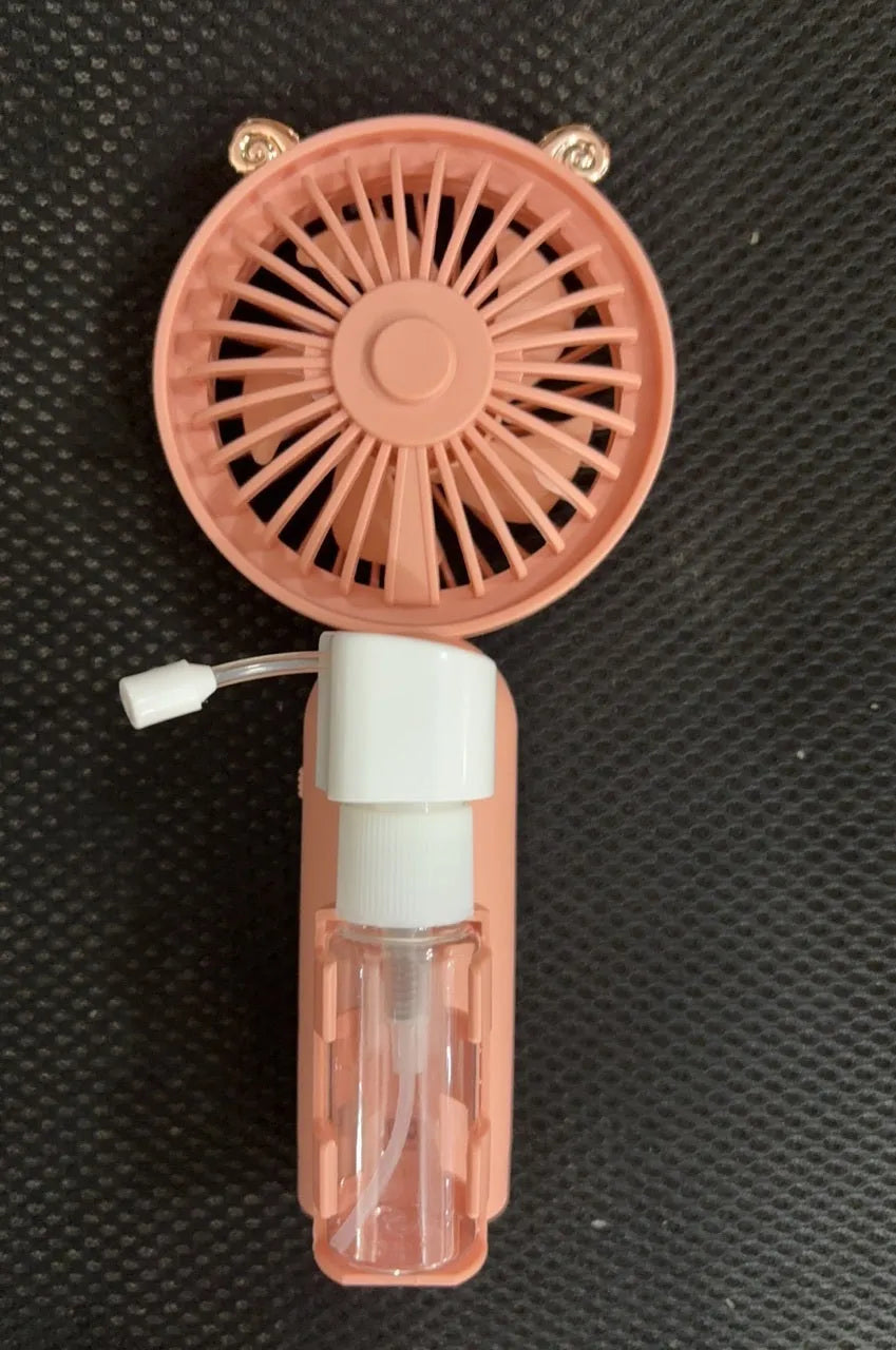 Plastic handheld nozzle fan with USB port in apricot, blue, green, orange, or pink colour.