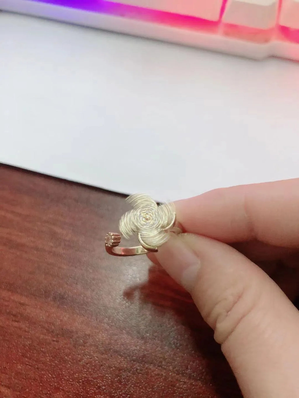 Geometric spinning windmill ring in electroplated copper with gold or silver colour option