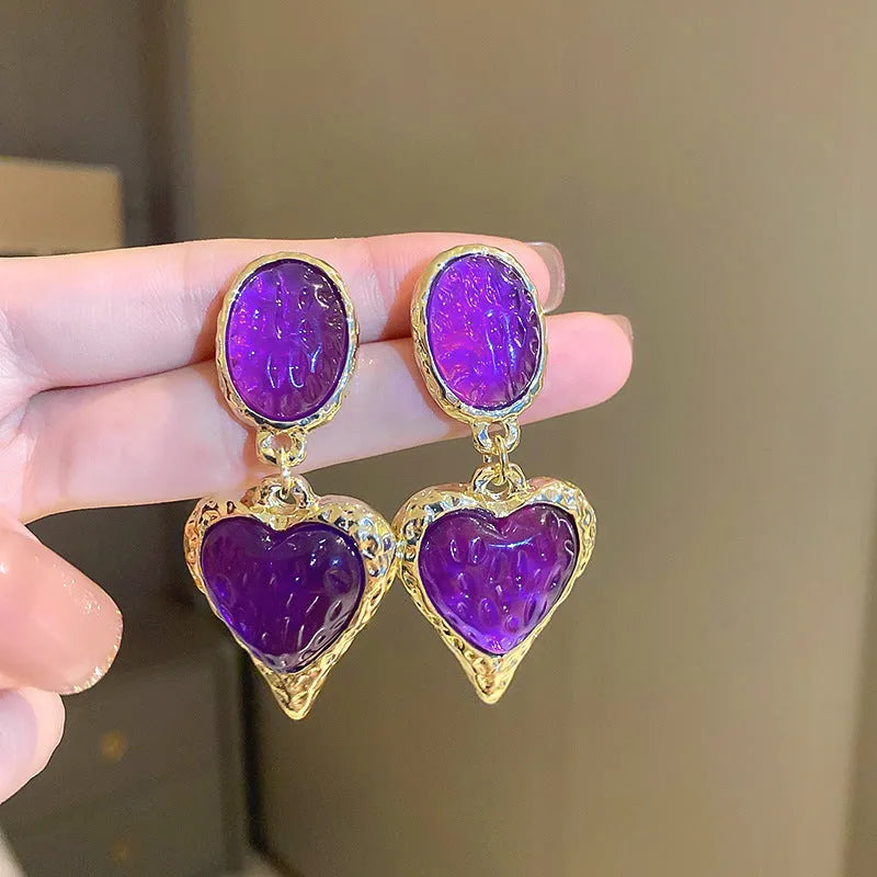 Silver needle pleated oval love heart stud earrings in green, purple, red, and yellow and white colours.