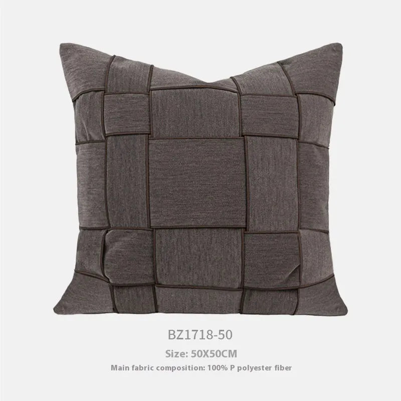 Square chenille woven cushion in beige colour showing textured surface
