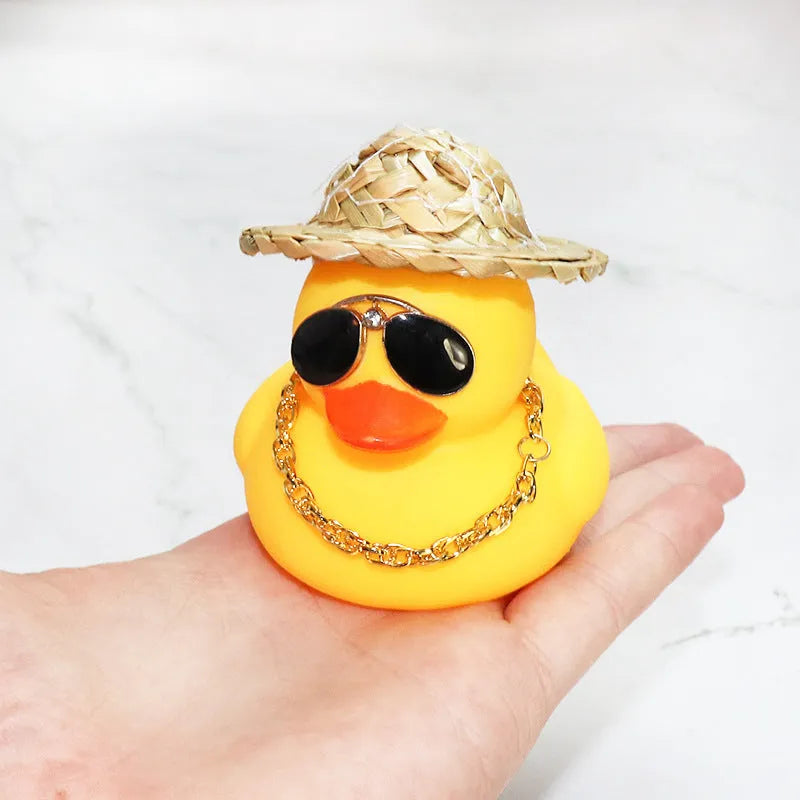 Straw hat yellow duck cartoon car ornament with matte finish and sunglasses accessory