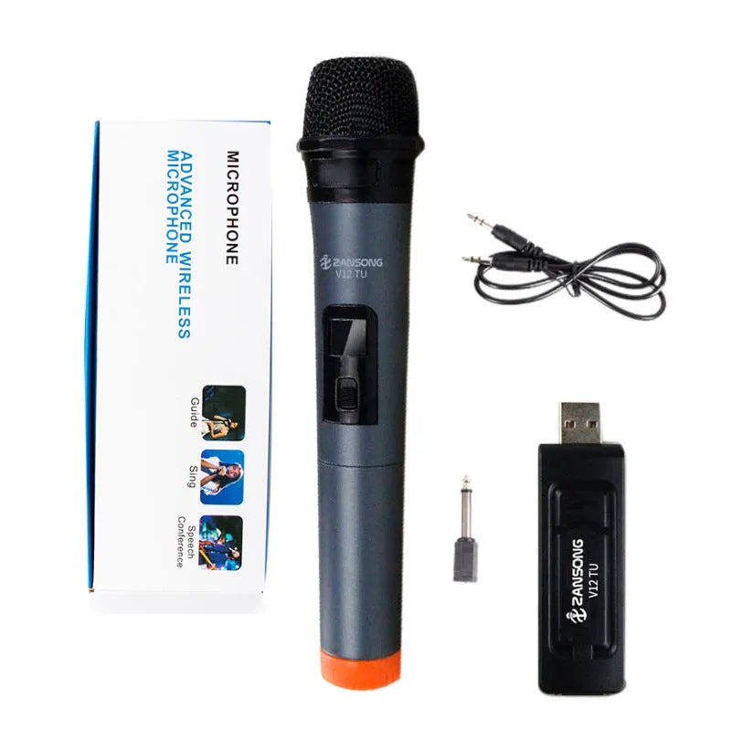 Black ZANSONG V12 dynamic wireless microphone with USB receiver and cables on a table.
