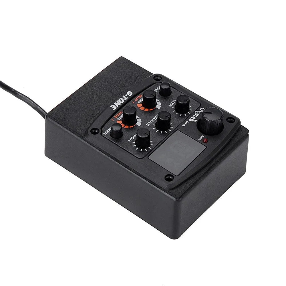 Black Cherub GT-6 acoustic guitar hole-mount preamp with volume, tone, EQ, and effects knobs.