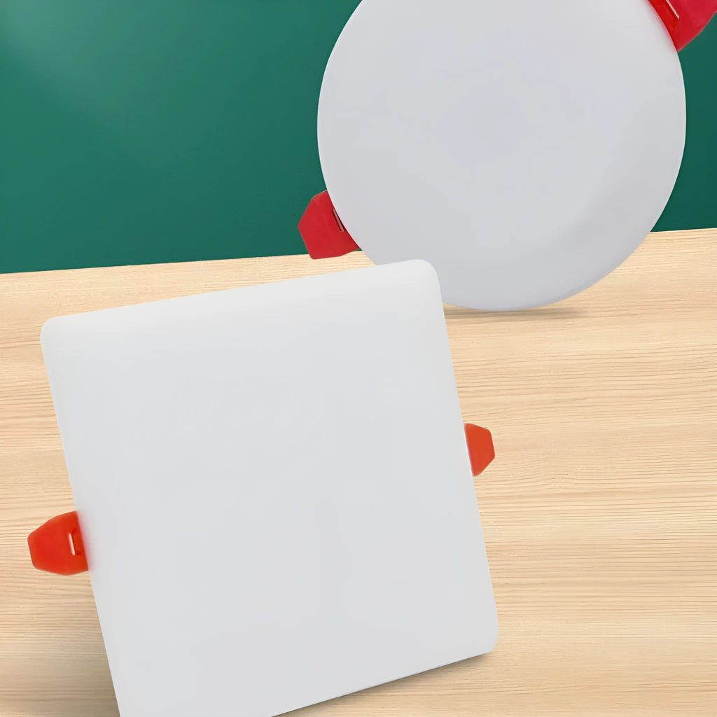 Ultra-thin aluminium LED panel light on a ceiling, showing circle and square shape options.