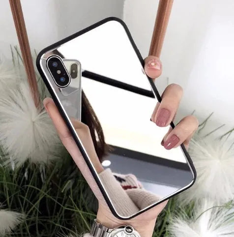 Black iPhone mirror phone case showing reflective back, compatible with iPhone X and 7/8 Plus models.