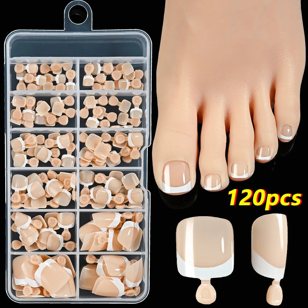 Open box showing 120 French style toe nail pieces with white tips in various nude colours.