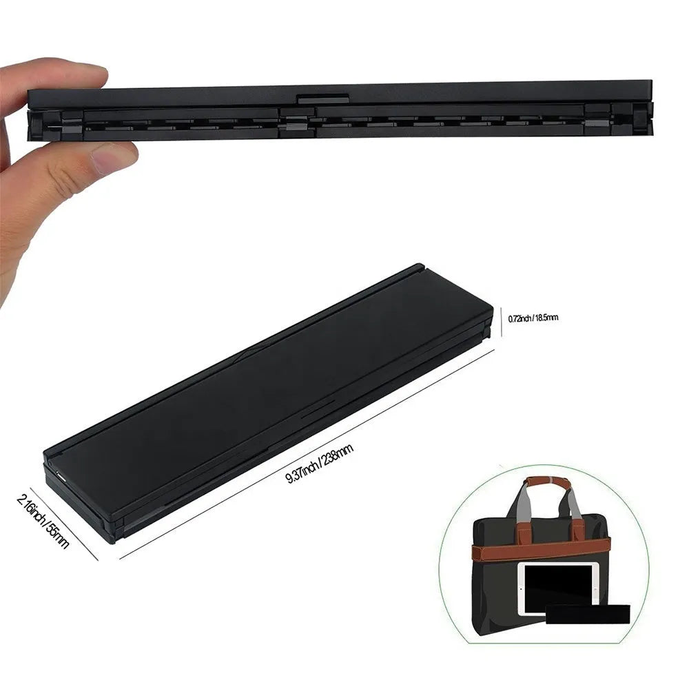 Black folding wireless Bluetooth keyboard for tablets with aluminium bottom and wrist support