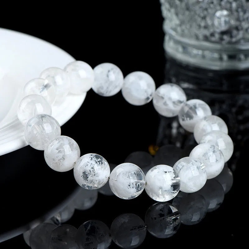 Women's geometric crystal bracelet with natural blizzard snowflake round beads in 5A or 6A colour variations