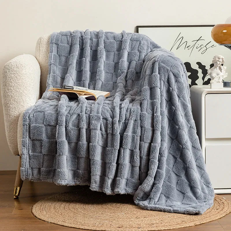 Geometric pattern polyester blanket in creamy white colour showing modern simple design