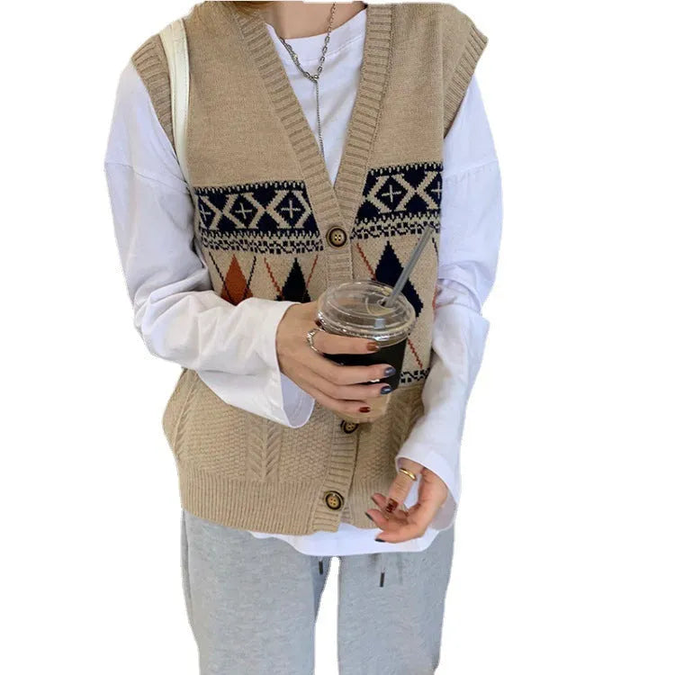 Sleeveless loose diamond plaid cardigan top in khaki colour on a hanger.