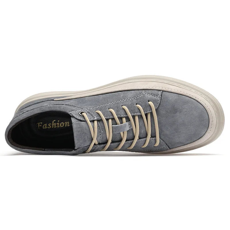Men's grey casual leather skate shoes with round toe and lace-up front.