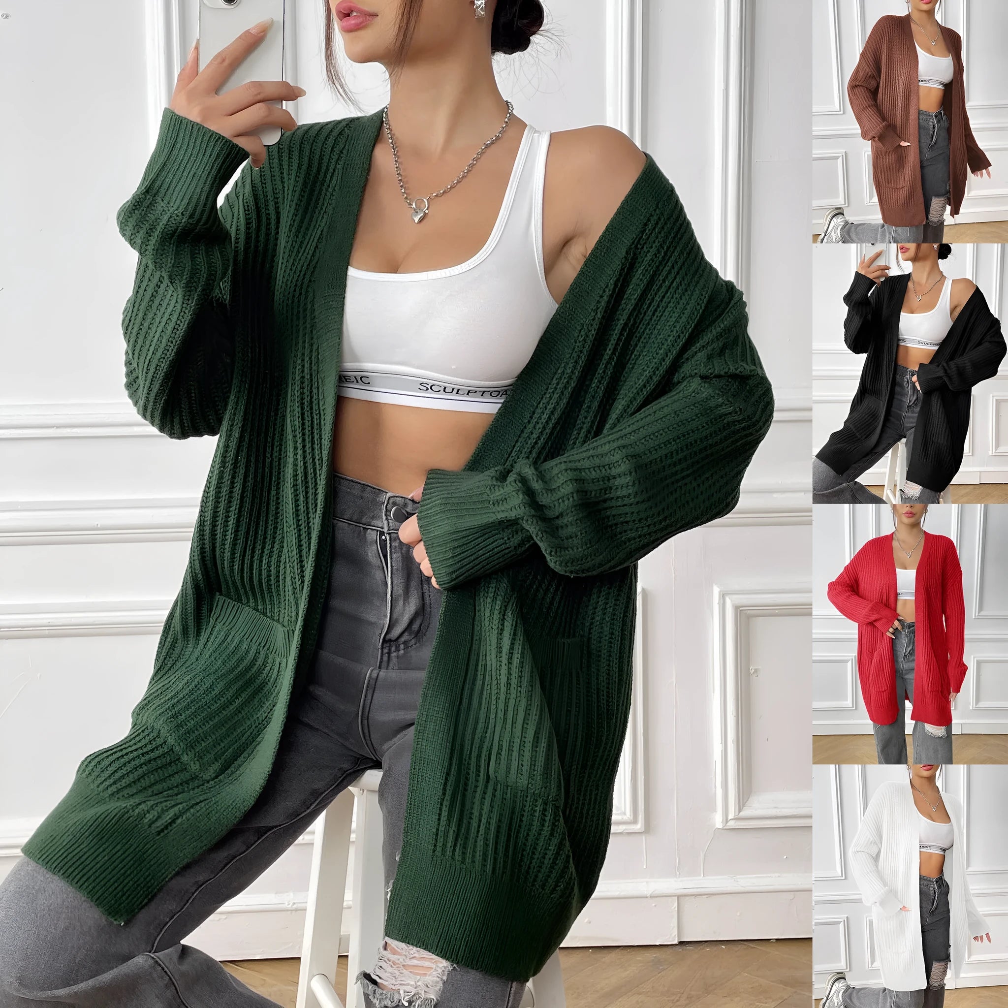 Loose fit women's acrylic cardigan sweater with double pockets in solid color