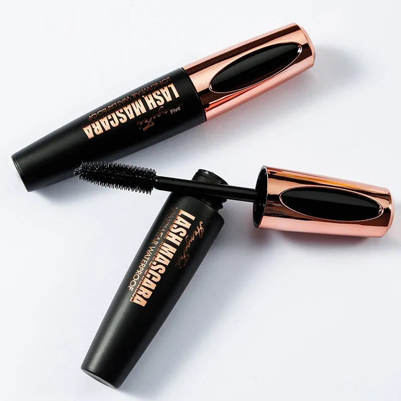 Black waterproof mascara tube for thick, long, curled lashes, shown with colour box and opp bag packaging.