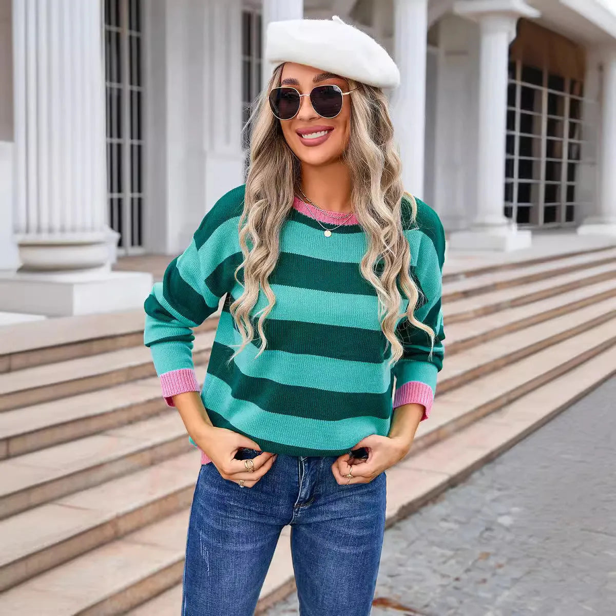 Women's long sleeve loose fit sweater in blue with round neck and knit pattern