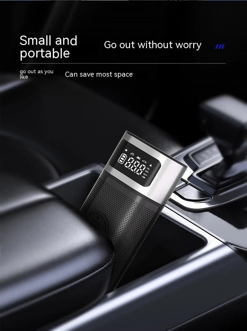 Black portable wireless smart vehicle air pump with LED light and USB cable