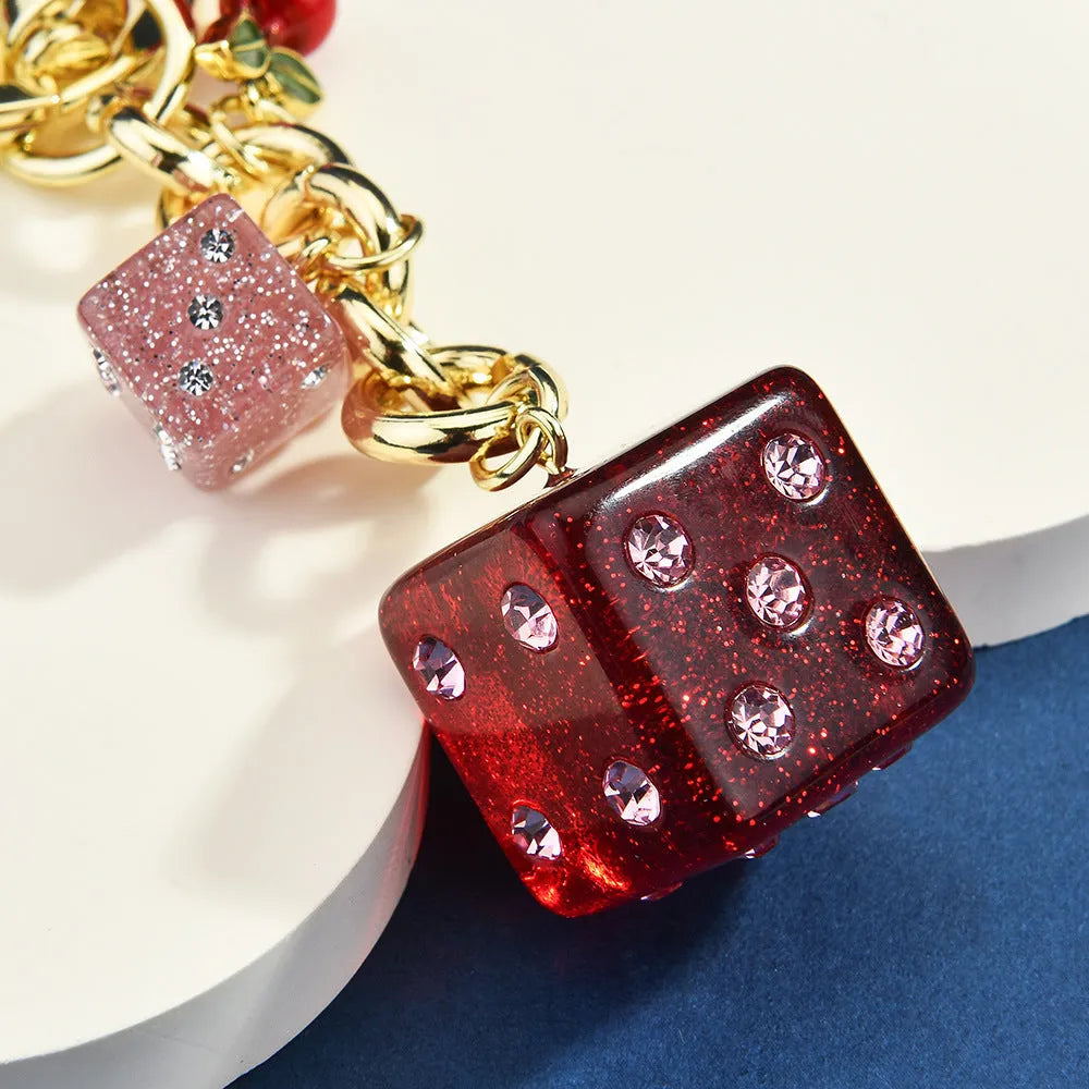 Square metal dice keychain pendant with cherry two-tone electroplated finish