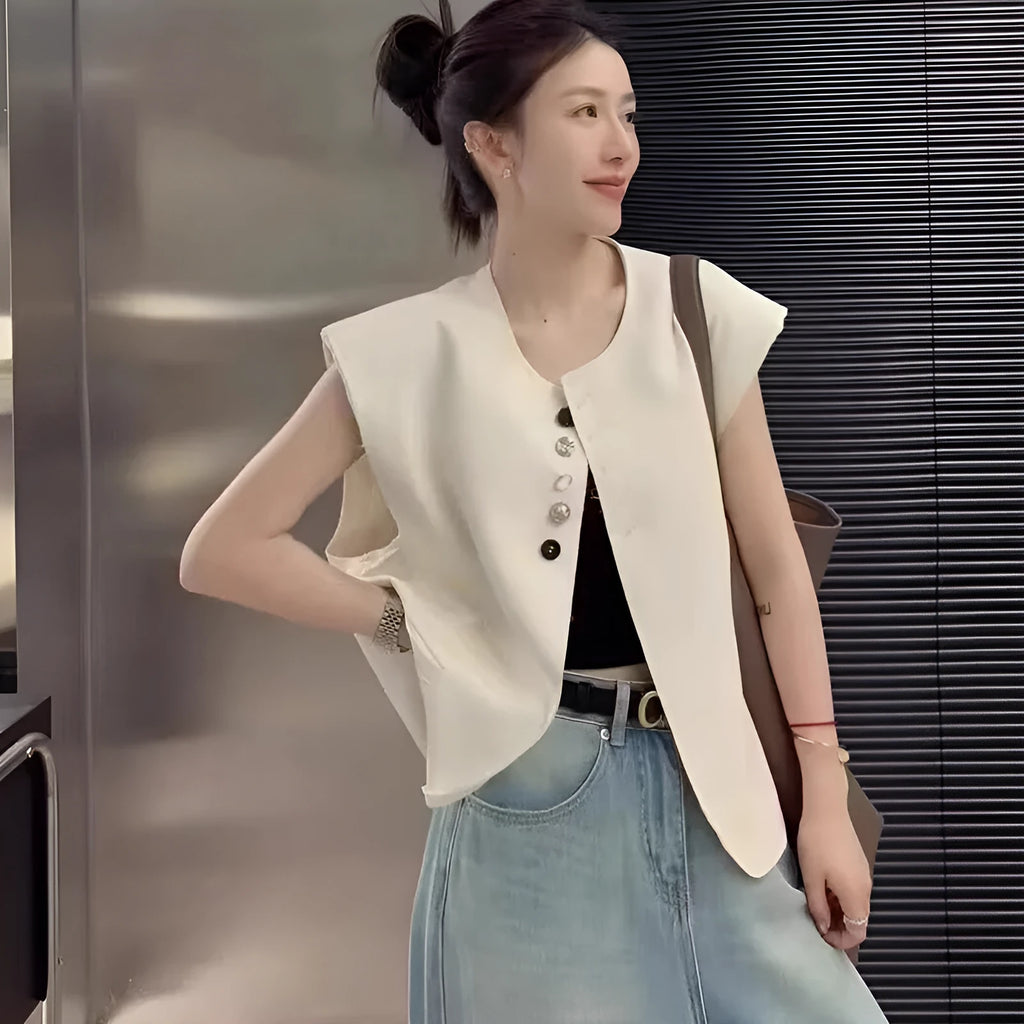 Women's loose fit polyester vest in milky white colour with front pocket