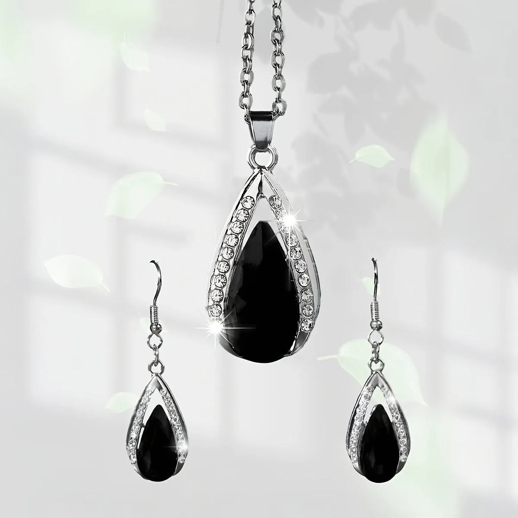Teardrop pendant necklace and earrings suite with water droplet design in alloy