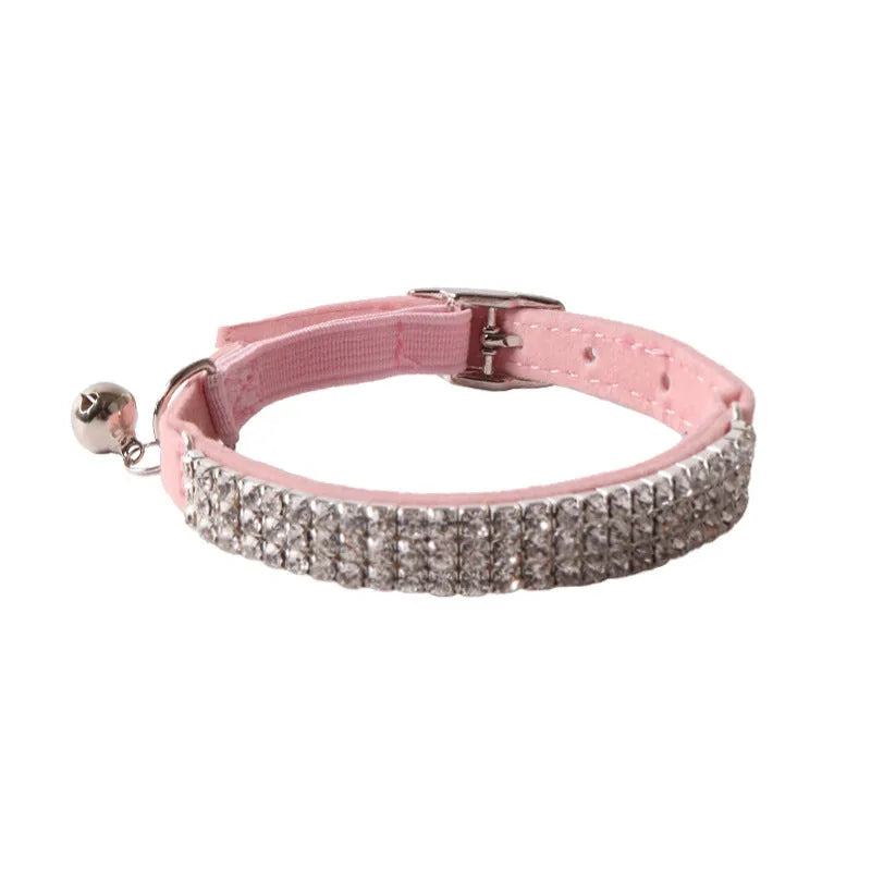 Soft flocking cat collar with elastic buckle in one of six colours on a white background.