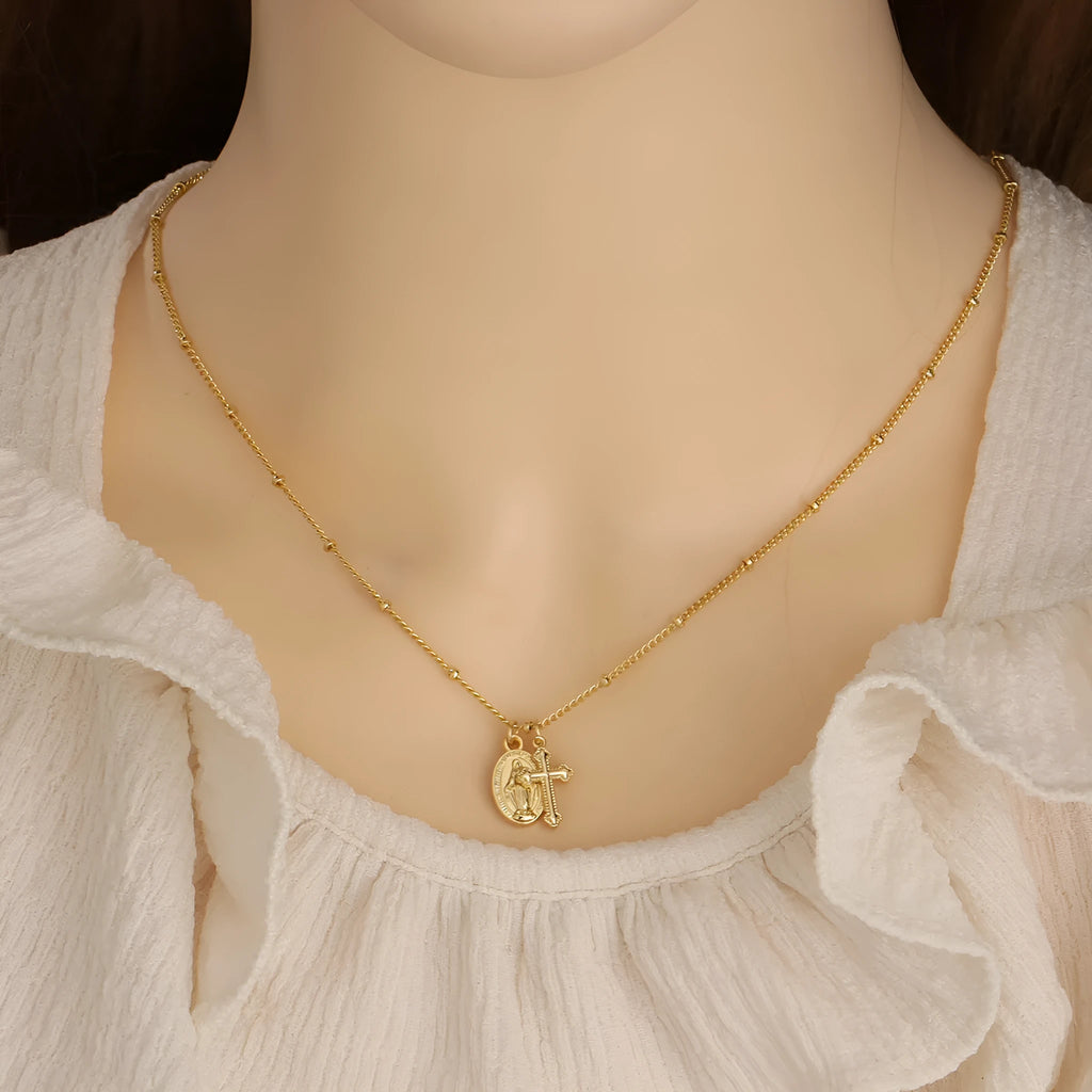 Gold geometric cross Virgin Mary necklace pendant on chain for women's religious jewellery