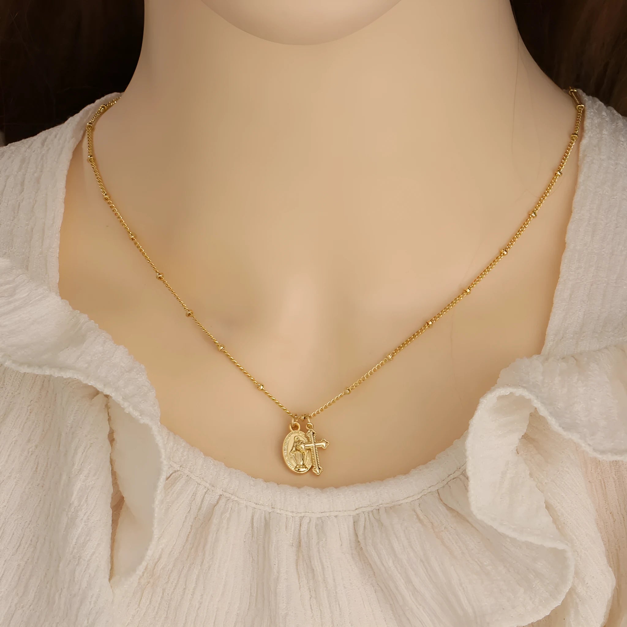 Gold geometric cross Virgin Mary necklace pendant on chain for women's religious jewellery
