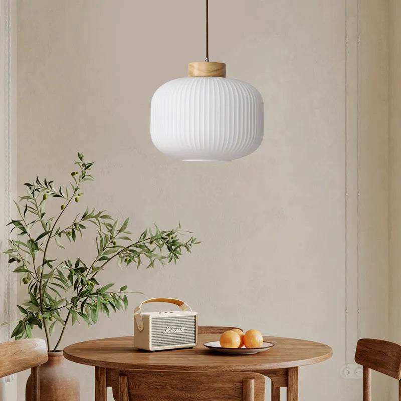 Chinese wooden pendant light with bamboo frame in retro bedroom setting showing three size options