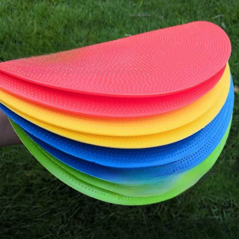 Coloured TPE football training disc marker 23cm diameter on grass field
