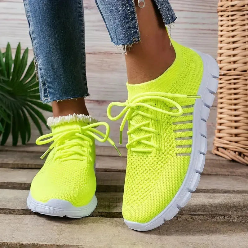 Women's breathable mesh flat shoes with round toe and front tie closure in various colours