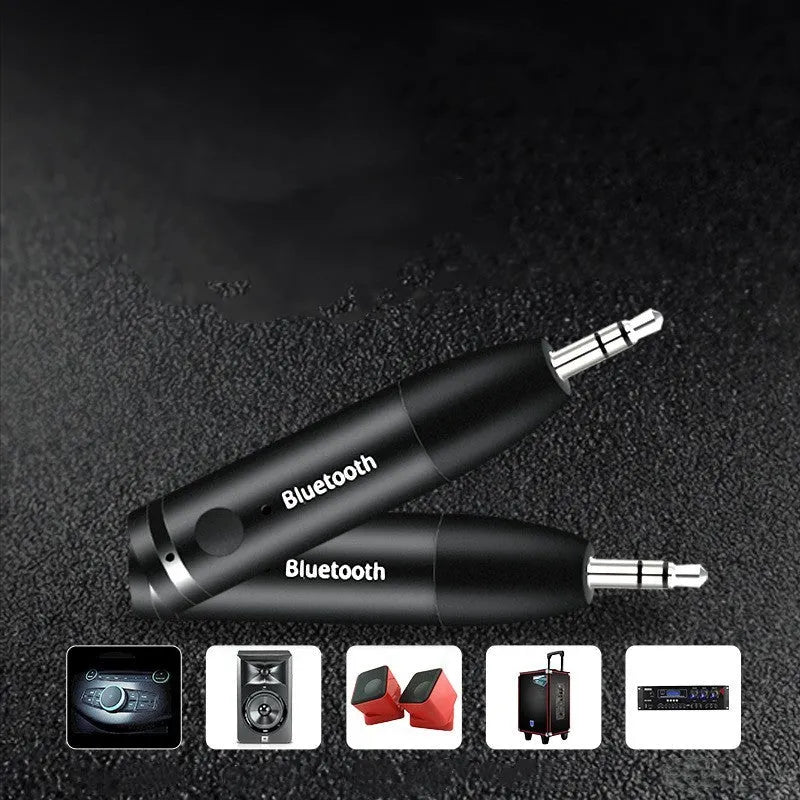 Black Bluetooth audio receiver with 3.5mm jack and USB charging port for car stereo connection