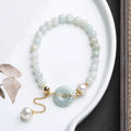 Natural emerald jade peace buckle pearl bracelet with geometric shapes and national style design