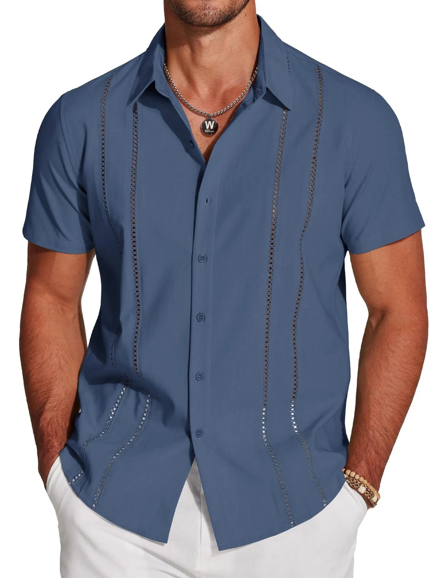 Man wearing a slim fit digital print Hawaiian short sleeve shirt in a casual setting