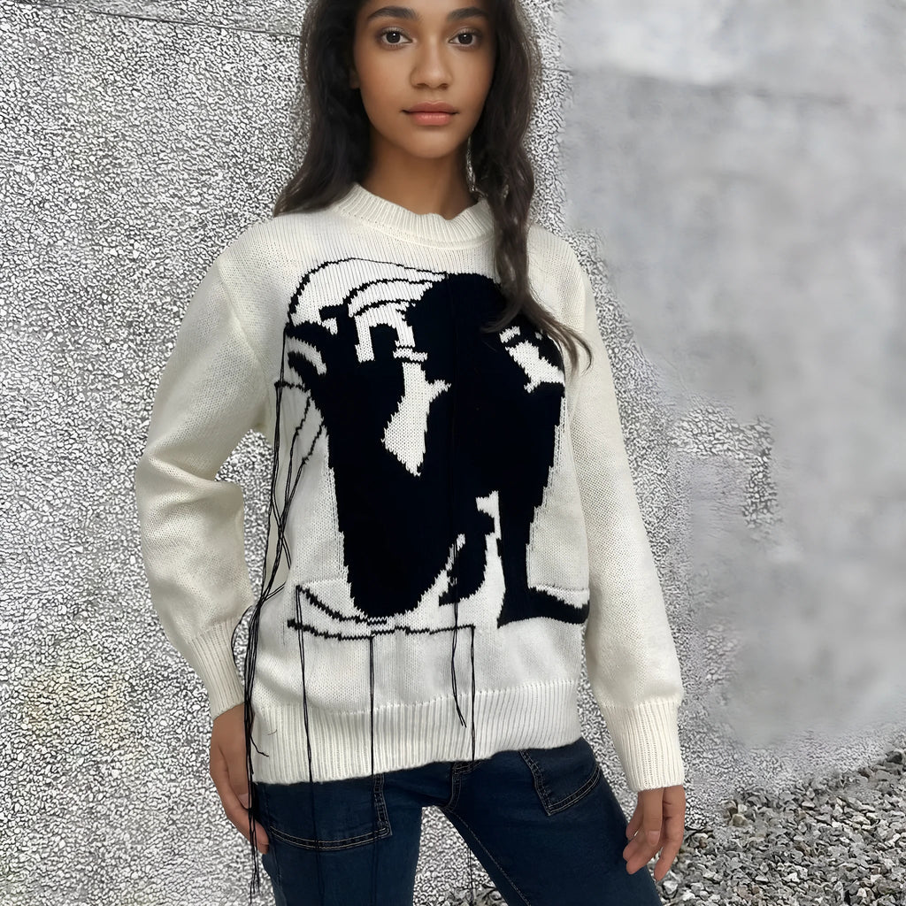 Grey women's alpaca wool sweater with abstract pattern and tassel design details