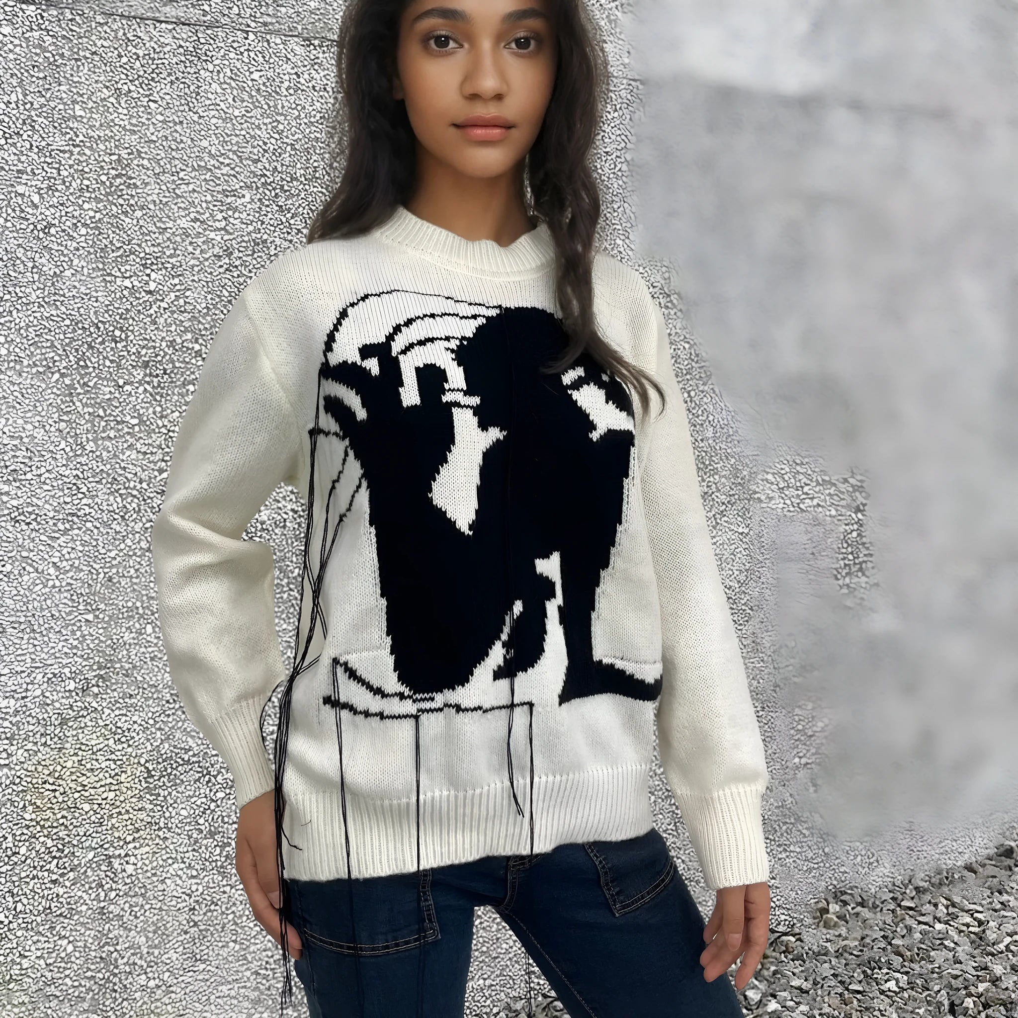 Grey women's alpaca wool sweater with abstract pattern and tassel design details