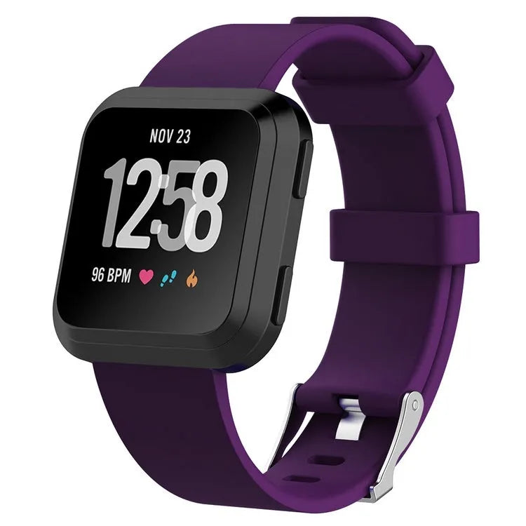 Fitbit Versa Lite replacement wrist strap showing colour options including black, blue, purple, red, and yellow