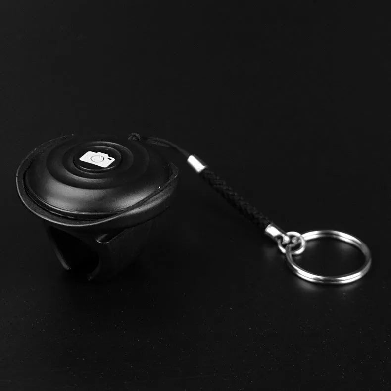 Black Bluetooth selfie remote shutter control for wireless phone camera operation