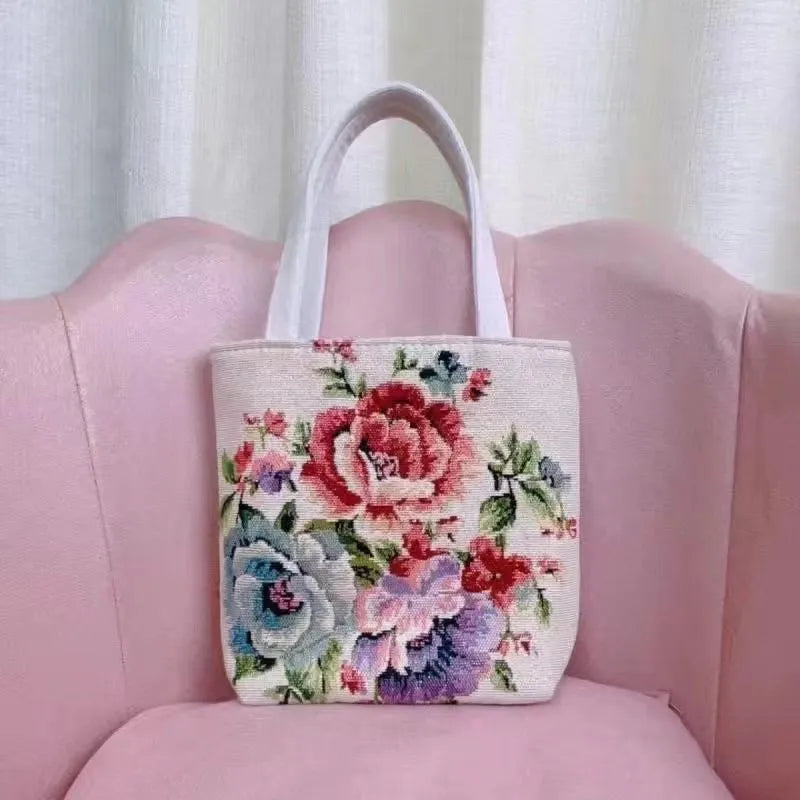 Double-sided gold wire embroidered canvas tote bag showing front and back design, available in multiple sizes and colours.