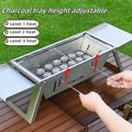 Small metal foldable portable charcoal grill for outdoor camping and picnics